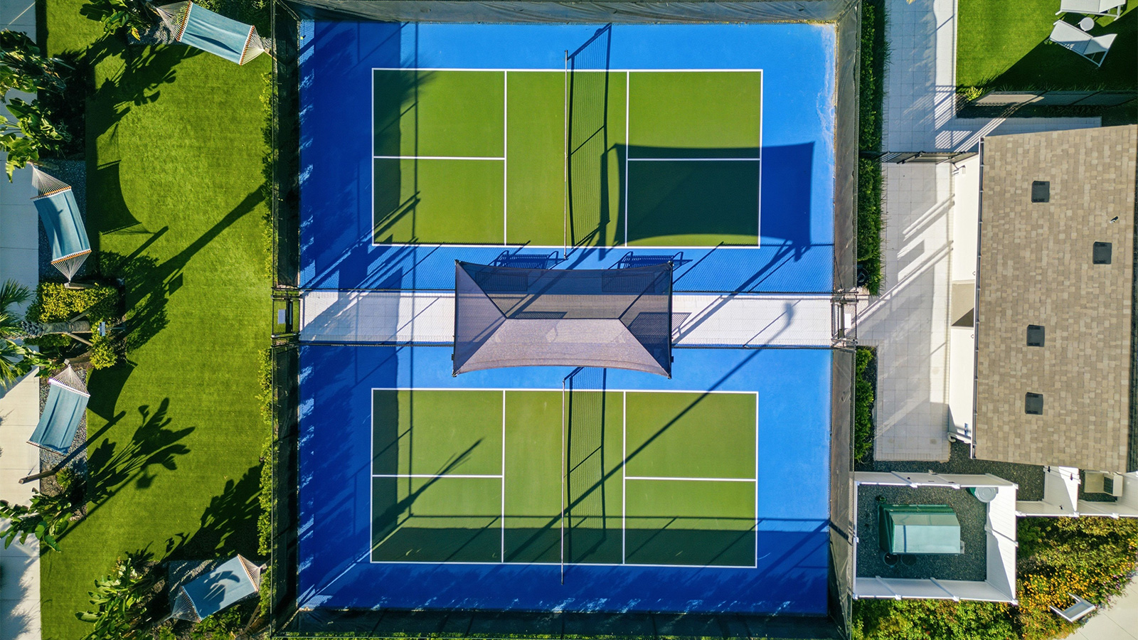 fenced in reservable pickleball court for residents of Yardly Crossings houses in Deland, FL